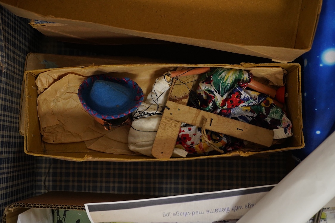 A Pelham Puppet related collection, including four boxed puppets; an Ostrich, a Type SS Clown, a Dutch Girl, a Girl, an oriental lady in a related box, a Junior Pelham Ostrich, together with a number of other marionettes